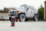 Washing this Toyota FJ Cruiser to remove car wax with Jay Leno's Garage Clean Strip.