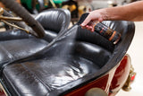 Leather Cleaner from Jay Leno's Garage Australia cleaning leather seats to remove stains.